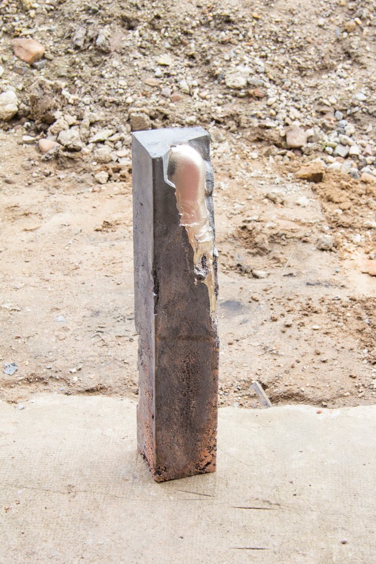 Soft Core, 30 tons & a Hammer by Nino Maaskola, 2022, aluminium, brass