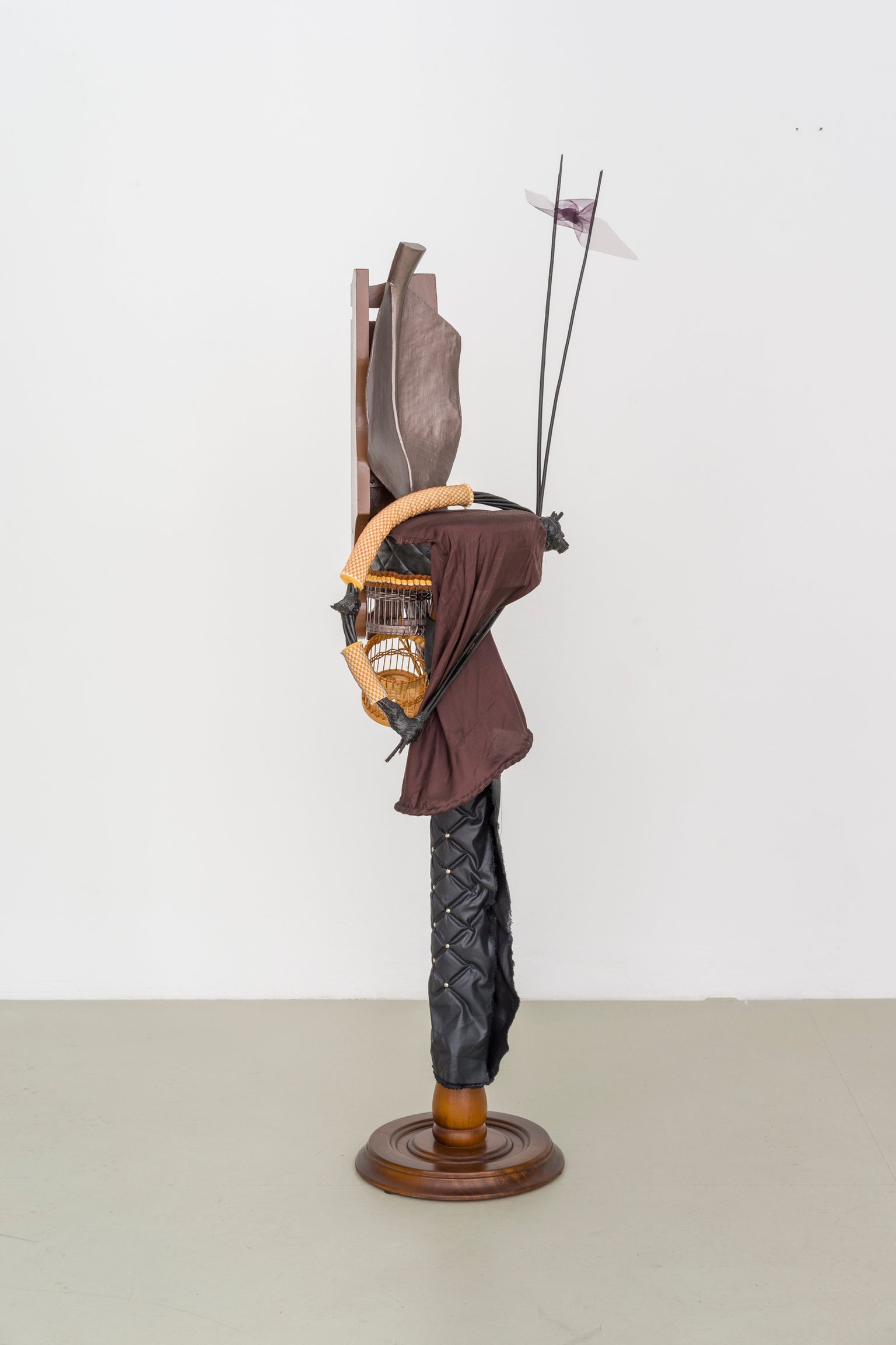 Strip and loom by Miriam Schmitz, 2024, wood, upholstery nails, fabric, foam, raffia, acrylic paint