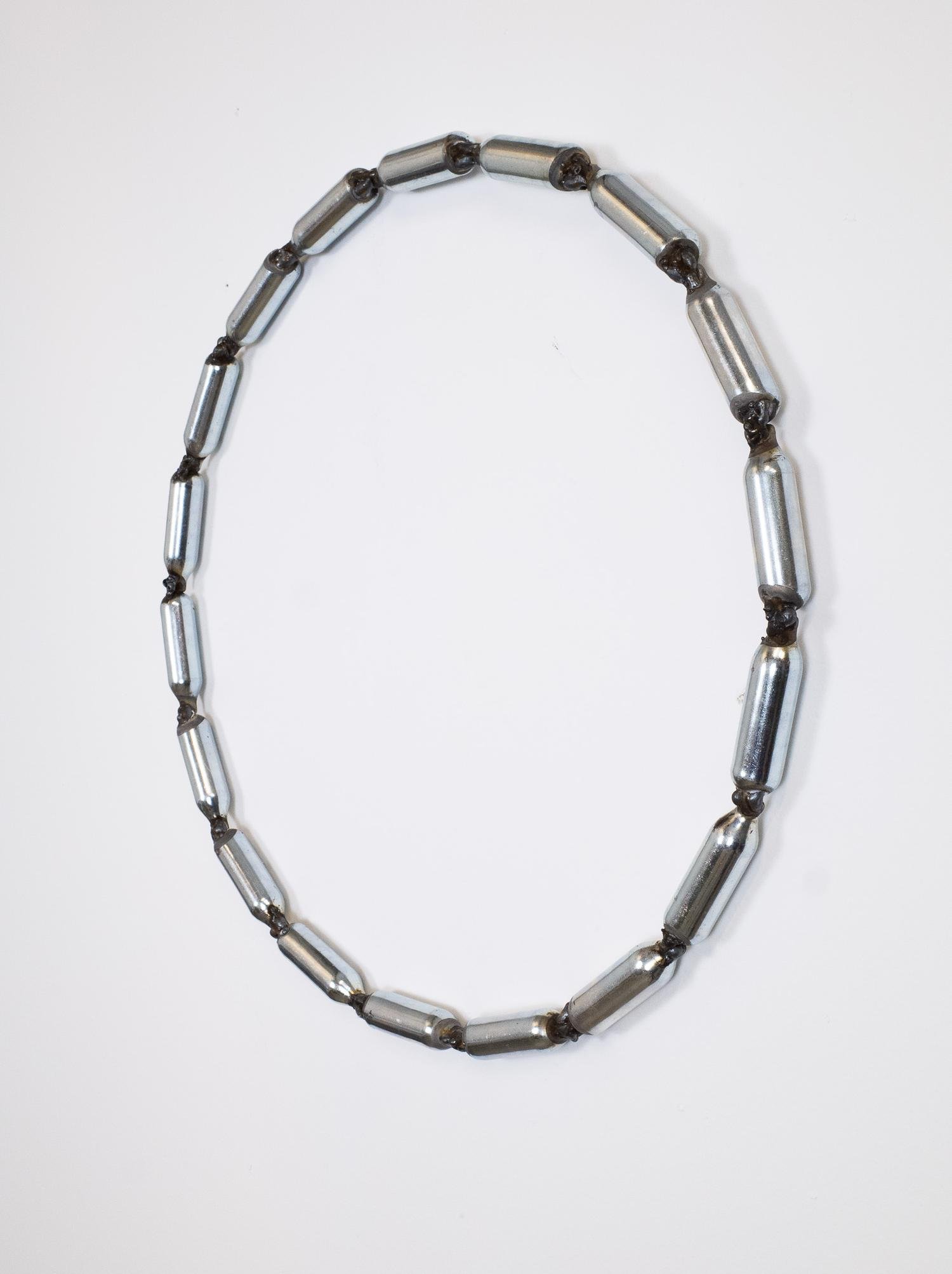 Silver petals by Matt Muir, 2023, nitrous oxide capsules