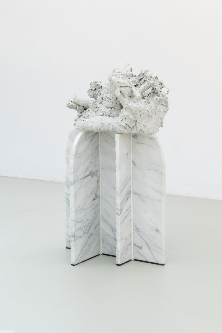 Maa by Nino Maaskola, 2025, marble, wood, resin, pigments