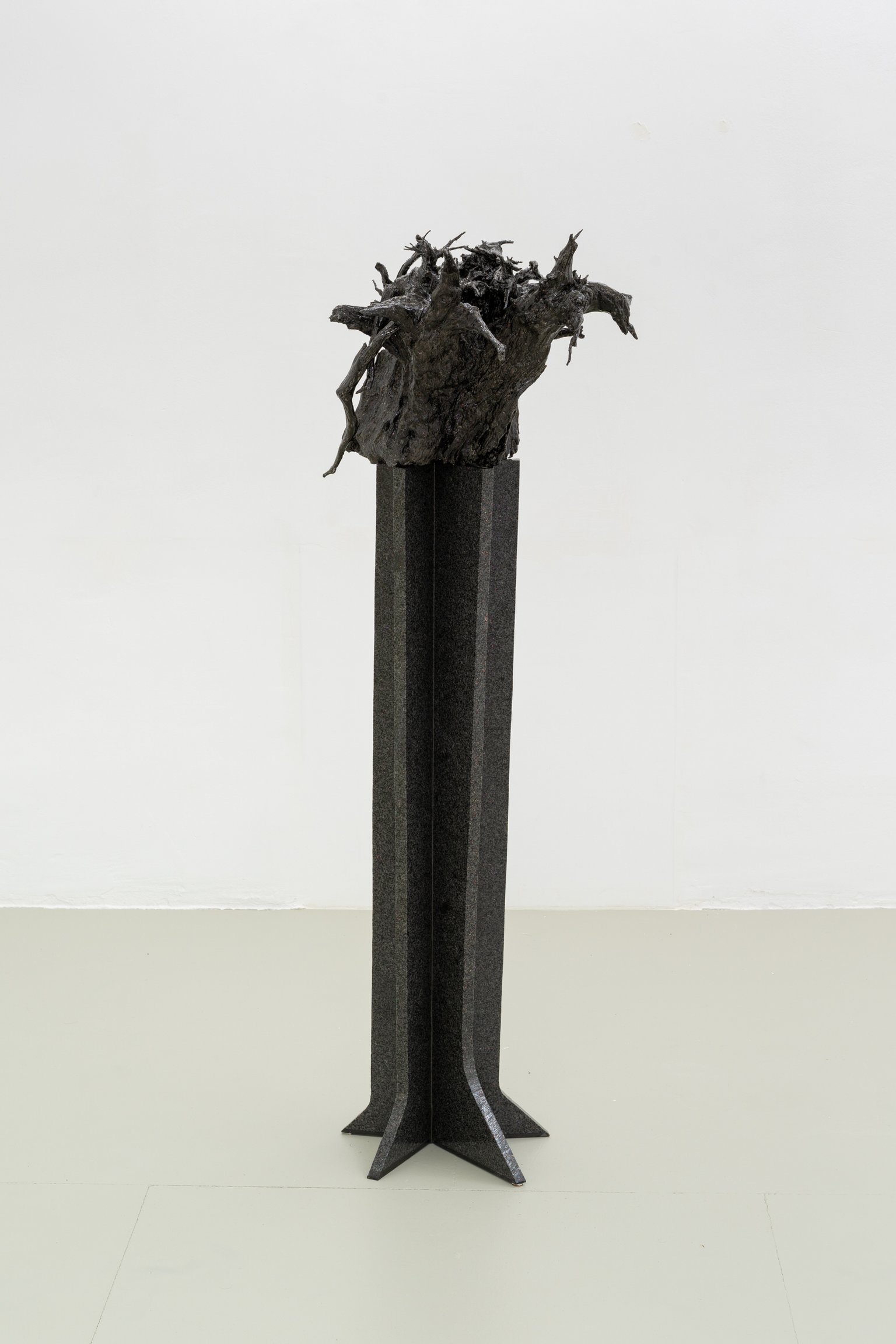 Maa by Nino Maaskola, 2025, granite, wood, resin, pigments