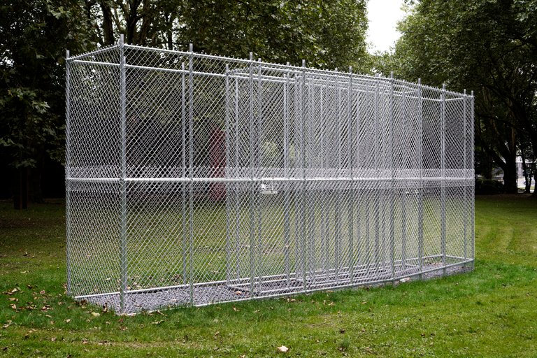 Shelter by Emil Walde, 2024, galvanized steel, basalt chippings