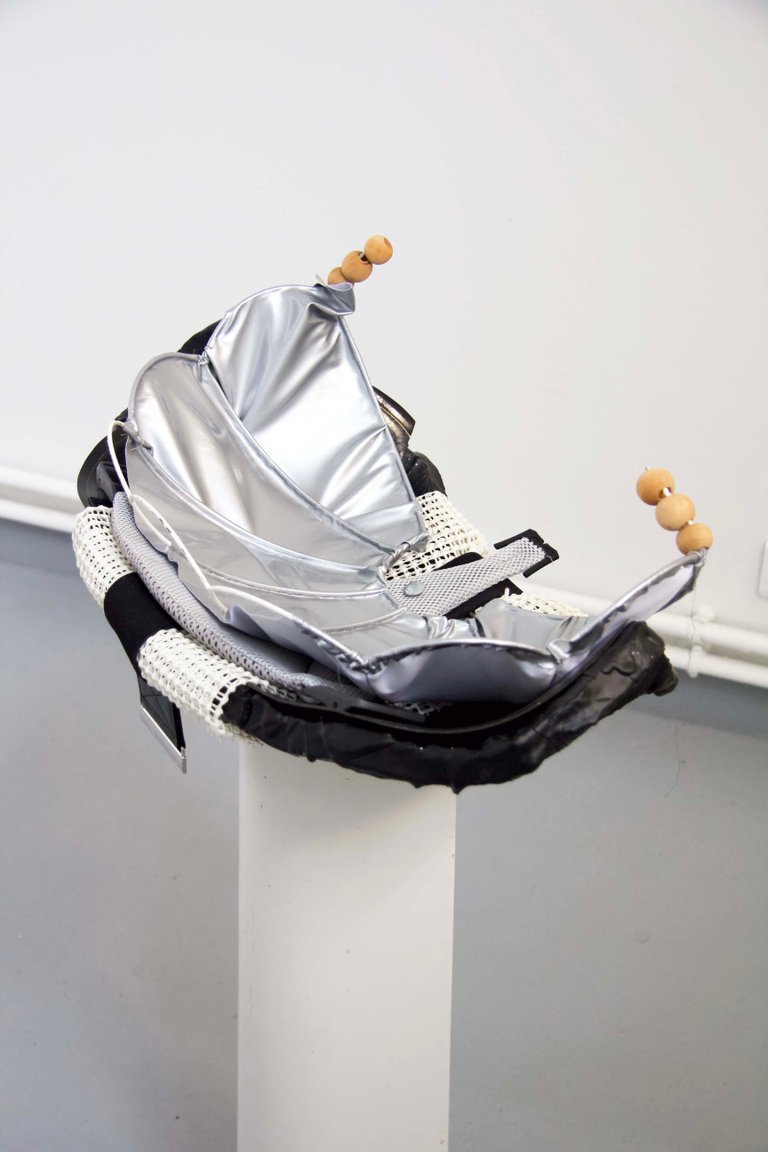 Padlock by Miriam Schmitz, 2022, plaster, varnish, plastic, steel, wood, ceramic