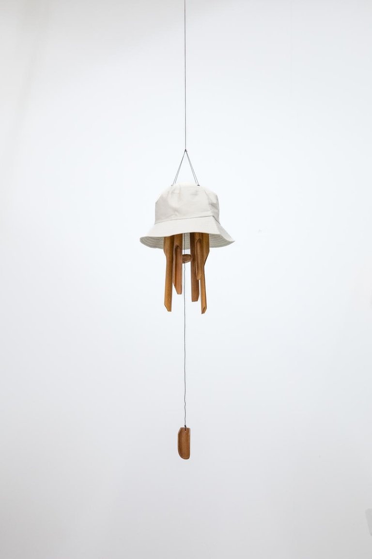 Windplay by Matt Muir, 2023, bucket hat, wind chime