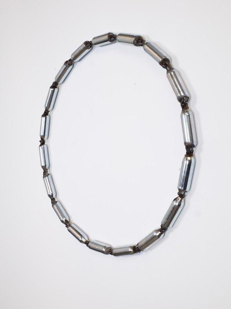 Silver petals by Matt Muir, 2023, nitrous oxide capsules