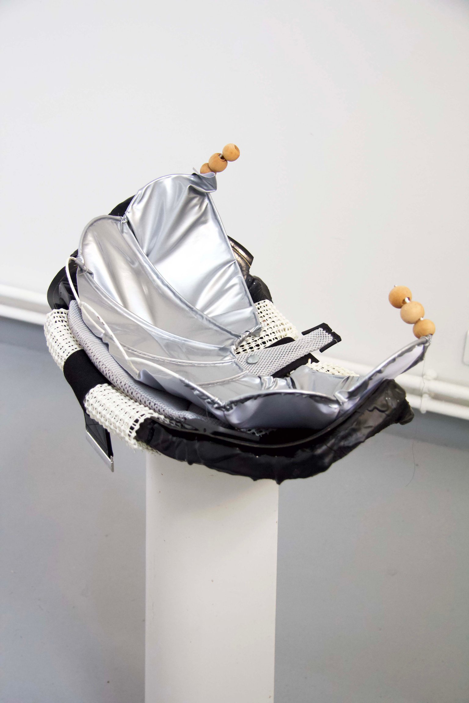 Padlock by Miriam Schmitz, 2022, plaster, varnish, plastic, steel, wood, ceramic