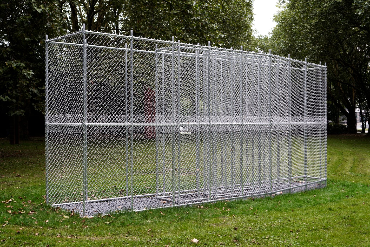 Shelter by Emil Walde, 2024, galvanized steel, basalt chippings