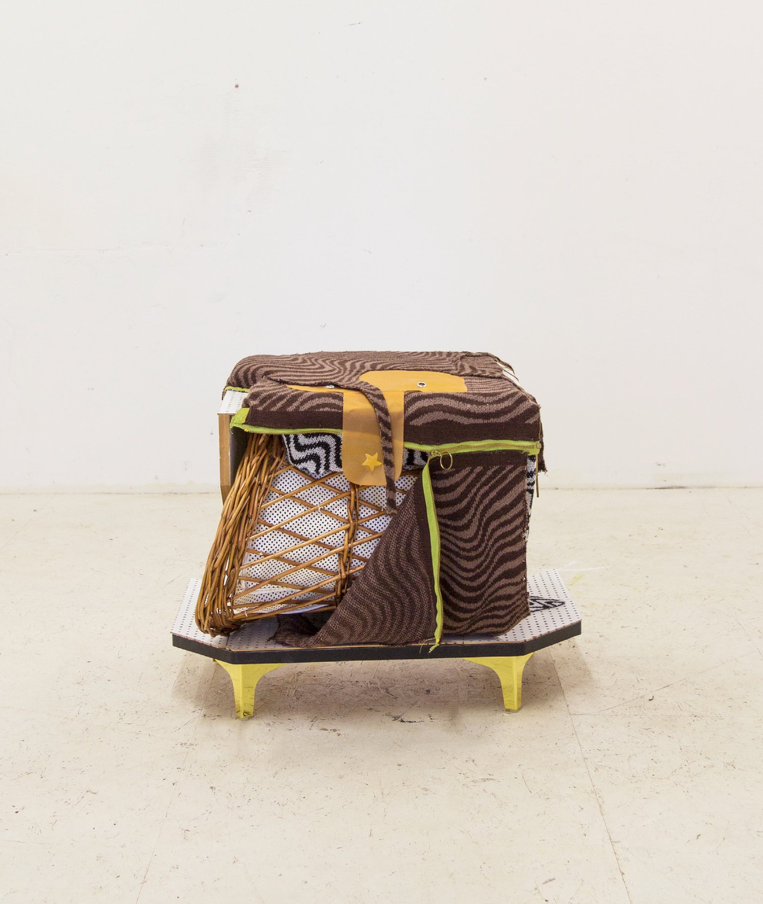 Pickled copy of your pinch by Miriam Schmitz, 2022, wood, raffia, fabric, zipper, leather, plastic, brass