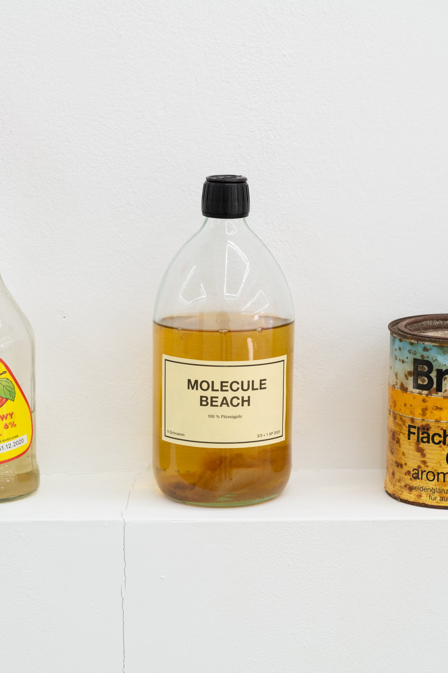 1 L Schramm (Molecule Beach) by Lena Schramm, 2025, BOTTLE, LIQUID, STRIPPING, SEALING WAX